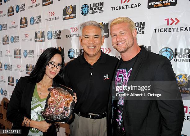 Wrestlers AJ Lee, Ricky "The Dragon" Steamboat and Dolph Ziggler attend Day 3 of Wizard World Chicago Comic Con 2013 held at the Donald E. Stephens...