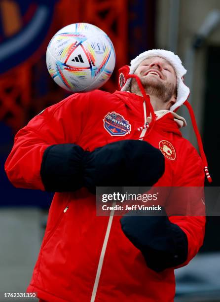 Calgary Flames player warms up with a soccer ball at Commonwealth Stadium on October 28, 2023 in Edmonton, Alberta.