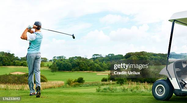 driving through - golf - golfswing stock pictures, royalty-free photos & images