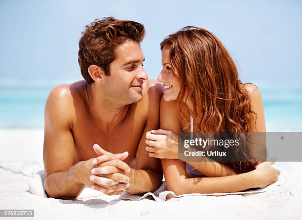 charming couple relaxing at a vacation spot - charming stock pictures, royalty-free photos & images