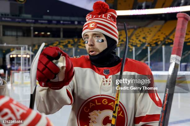 Greer of the Calgary Flames looks on before a team photo before practice at Commonwealth Stadium on October 28, 2023 in Edmonton, Alberta.