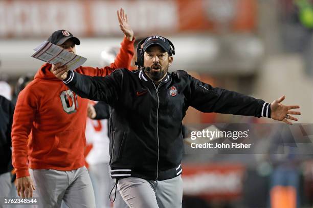 Ryan Day head coach of the Ohio State Buckeyes reacts to a penalty during the second quarter against the Wisconsin Badgers at Camp Randall Stadium on...