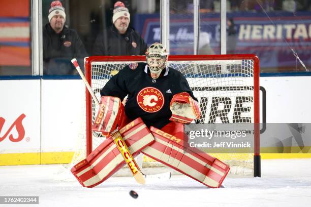 Goaltender Jacob Markstrom of the Calgary Flames makes a save during practice at Commonwealth Stadium on October 28, 2023 in Edmonton, Alberta.