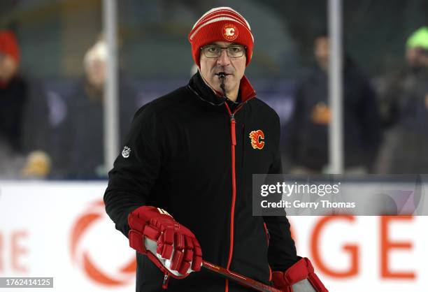 Head coach Ryan Huska of the Calgary Flames looks on during team practice at Commonwealth Stadium on October 28, 2023 in Edmonton, Alberta.