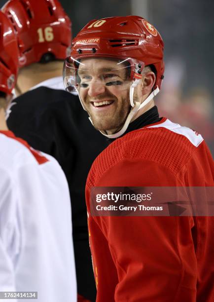 Jonathan Huberdeau of the Calgary Flames looks on during practice at Commonwealth Stadium on October 28, 2023 in Edmonton, Alberta.