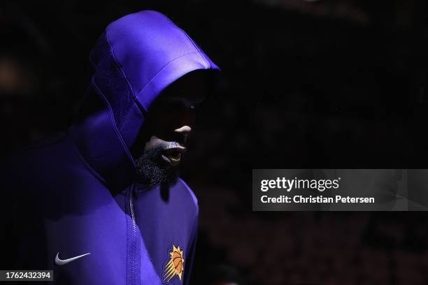 Kevin Durant of the Phoenix Suns walks onto the court before the NBA game against the Utah Jazz at Footprint Center on October 28, 2023 in Phoenix,...