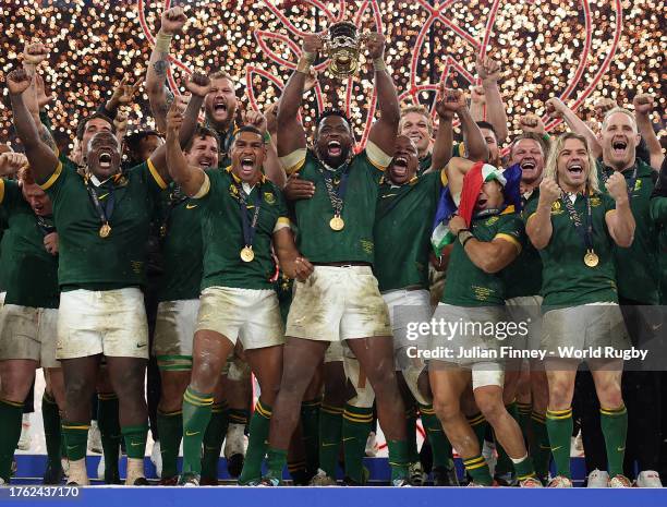 Siya Kolisi of South Africa lifts The Webb Ellis Cup following the Rugby World Cup Final match between New Zealand and South Africa at Stade de...