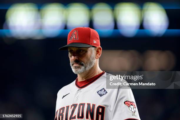 Manager Torey Lovullo of the Arizona Diamondbacks walks across the field in the ninth inning against the Texas Rangers during Game Two of the World...