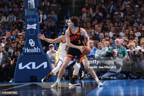 Josh Giddey of the Oklahoma City Thunder handles the ball during the game against the Golden State Warriors during the In-Season Tournament on...