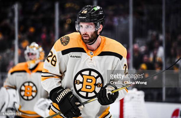 Derek Forbort of the Boston Bruins prepares for a face-off during the second period against the Detroit Red Wings at TD Garden on October 28, 2023 in...