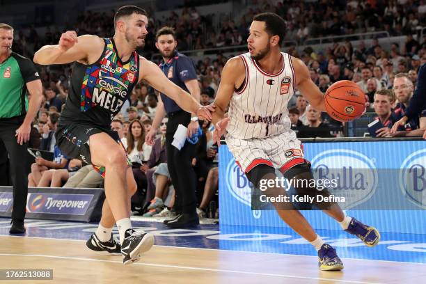 Tyler Harvey of the Hawks handles the ball against Chris Goulding of United during the round five NBL match between Melbourne United and Illawarra...