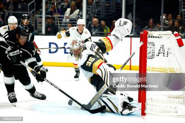 Logan Thompson of the Vegas Golden Knights makes a save against Anze Kopitar of the Los Angeles Kings in the second period at Crypto.com Arena on...