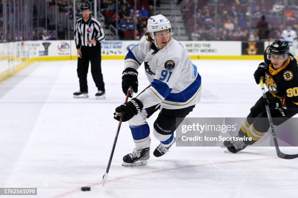 Cleveland Monsters left wing Kent Johnson controls the puck during the third period of the American Hockey League game between the Providence Bruins...