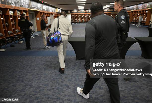 Colorado Buffaloes Head Coach Deion Sanders walks through the locker room after arriving at Rose Bowl Stadium to take on the UCLA Bruins on October...