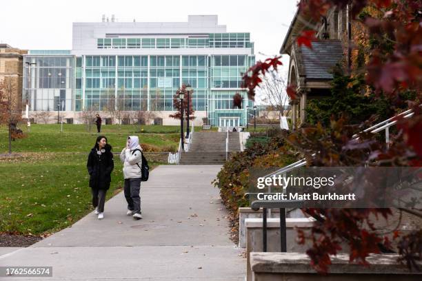 Cornell University students walk through campus on November 3, 2023 in Ithaca, New York. The university canceled classes after one of its students is...