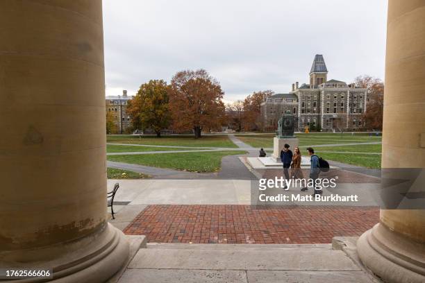 Cornell University students walk through campus on November 3, 2023 in Ithaca, New York. The university canceled classes after one of its students is...