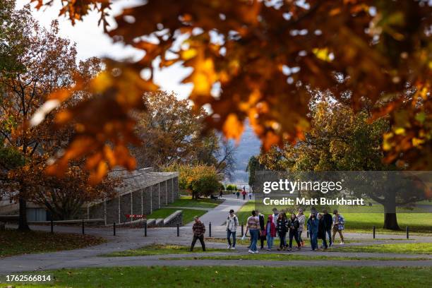 Tour group is led through the Cornell University campus on November 3, 2023 in Ithaca, New York. The university canceled classes after one of its...