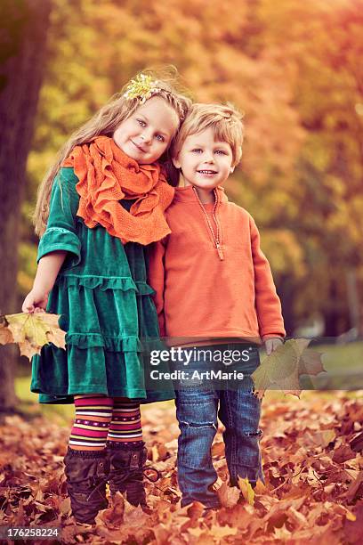 sister and brother outdoors - boy wearing girls clothes stock pictures, royalty-free photos & images