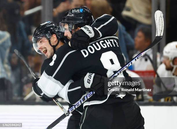 Kevin Fiala and Drew Doughty of the Los Angeles Kings celebrate a goal against the Vegas Golden Knights in the third period at Crypto.com Arena on...