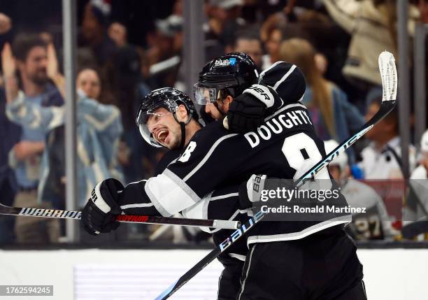 Kevin Fiala and Drew Doughty of the Los Angeles Kings celebrate a goal against the Vegas Golden Knights in the third period at Crypto.com Arena on...