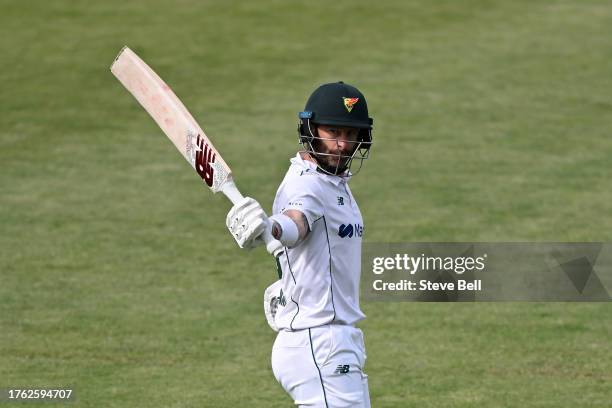 Matthew Wade of the Tigers celebrates scoring a century during the Sheffield Shield match between Tasmania and Queensland at Blundstone Arena, on...