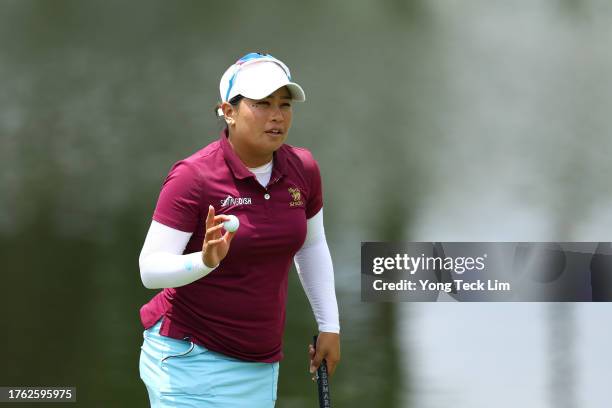 Jasmine Suwannapura of Thailand reacts after a putt on the 14th green during the final round of the Maybank Championship at Kuala Lumpur Golf and...