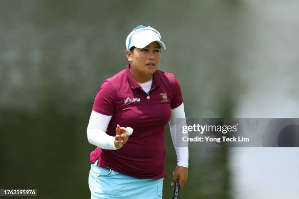 Jasmine Suwannapura of Thailand reacts after a putt on the 14th green during the final round of the Maybank Championship at Kuala Lumpur Golf and...