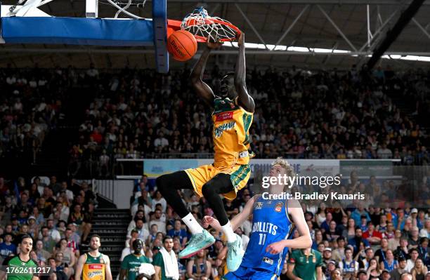 Majok Deng of the Jackjumpers slam dunks during the round five NBL match between Brisbane Bullets and Tasmania Jackjumpers at Nissan Arena, on...