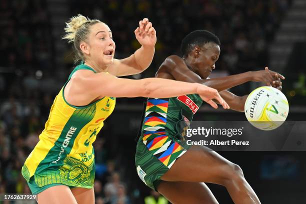 Bongiwe Msomi of South Africa and Jamie-Lee Price of Australia compete for the ball during game two of the international Test Match series between...