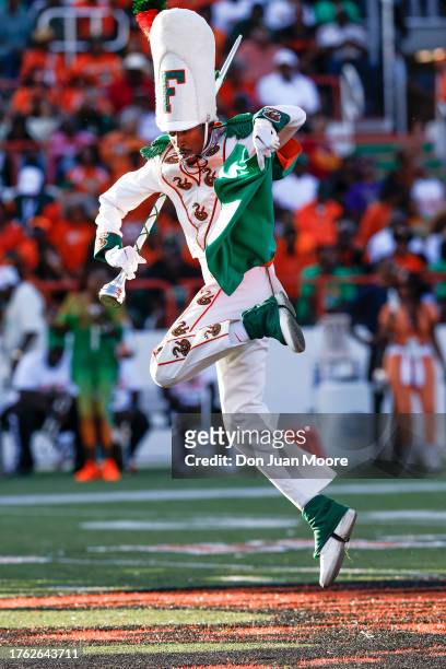 Drum Major of the Florida A&M University Marching band, The Marching 100, performs during half-time of the game against the Prairie View A&M Panthers...