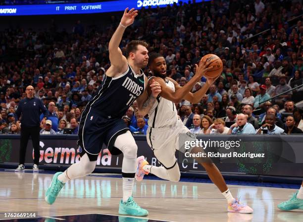 Luka Doncic of the Dallas Mavericks guards Mikal Bridges of the Brooklyn Nets at American Airlines Center on October 27, 2023 in Dallas, Texas. NOTE...