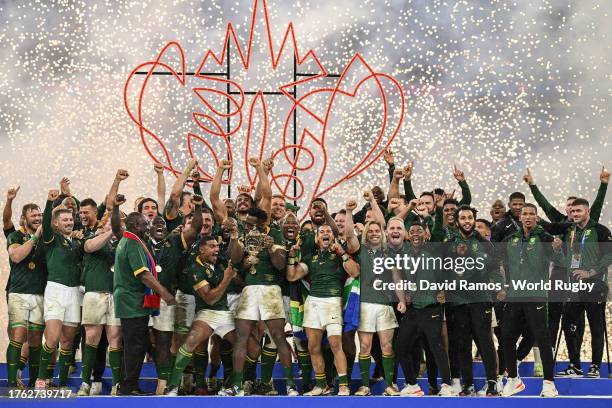 Siya Kolisi of South Africa lifts The Webb Ellis Cup following the Rugby World Cup Final match between New Zealand and South Africa at Stade de...