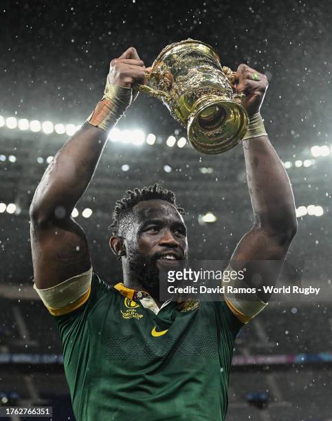 Siya Kolisi of South Africa celebrates with the The Webb Ellis Cup following the Rugby World Cup Final match between New Zealand and South Africa at...