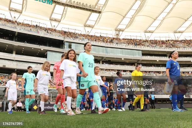 Samantha Kerr of the Matildas leads the team out onto the field during the AFC Women's Asian Olympic Qualifier match between Philippines and...