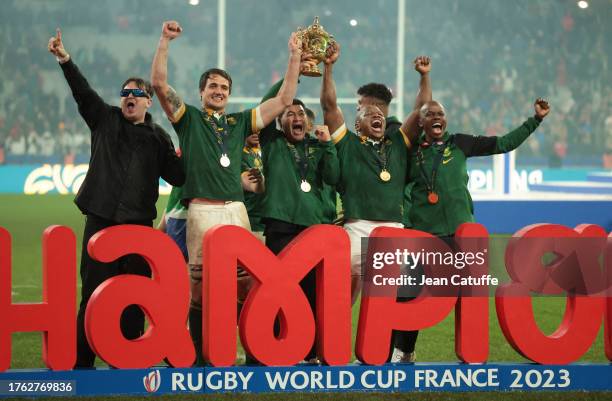 Franco Mostert, Bongi Mbonambi of South Africa celebrate the victory following the Rugby World Cup France 2023 Final between New Zealand and South...