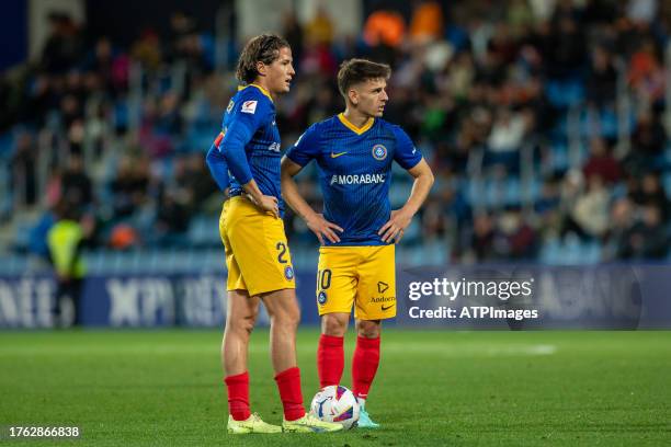 Ruben Bover and Ivan Gil of FC Andorra seen during the LaLiga Hypermotion 2023 - 2024 match between FC Andorra v Levante UD at Estadi Naciona at...