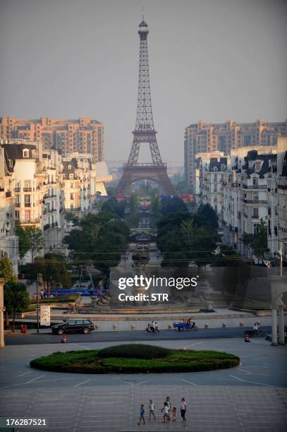 This picture taken on August 7, 2013 shows a replica of the Effel Tower in Tianducheng, a luxury real estate development located in Hangzhou, east...