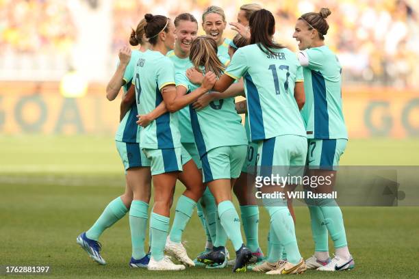 Clare Wheeler of the Matildas celebrates with team mates after scoring a goal during the AFC Women's Asian Olympic Qualifier match between...