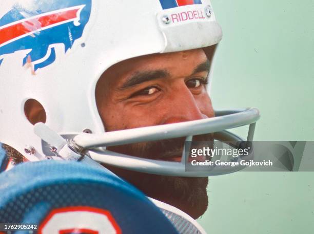 Running back O.J. Simpson of the Buffalo Bills looks on from the sideline during a game against the Denver Broncos at Rich Stadium on October 5, 1975...