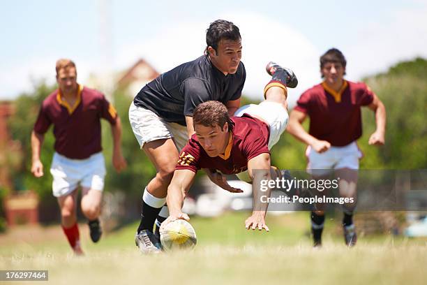 this game is not for the faint hearted - rugby game stock pictures, royalty-free photos & images