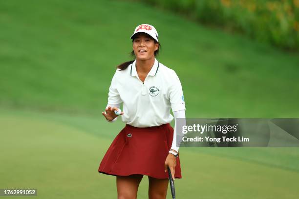 Celine Boutier of France celebrates after putt to beat Atthaya Thitikul of Thailand in a playoff ninth hole on the 15th green during the final round...