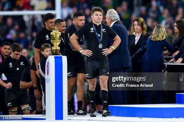 Beauden Barrett of New Zealand looks dejected as he walks past the The Webb Ellis Cup following the Rugby World Cup France 2023 Gold Final match...