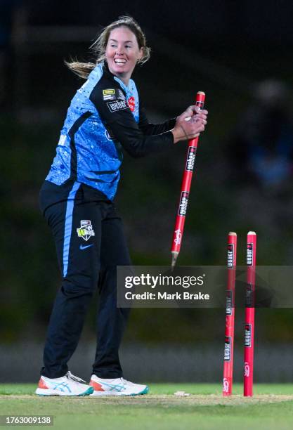 Amanda-Jade Wellington of the Adelaide Strikers pulls the stump out and runs out Mignon Du Preez of the Brisbane Heat during the WBBL match between...