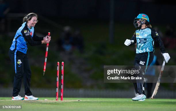 Amanda-Jade Wellington of the Adelaide Strikers pulls the stump out and runs out Mignon Du Preez of the Brisbane Heat during the WBBL match between...