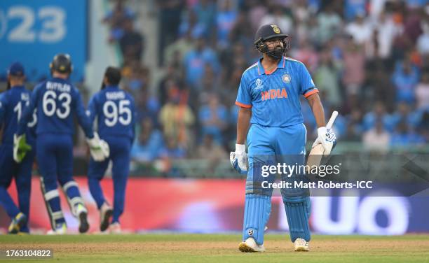Rohit Sharma of India makes their way off after being dismissed during the ICC Men's Cricket World Cup India 2023 between India and England at...