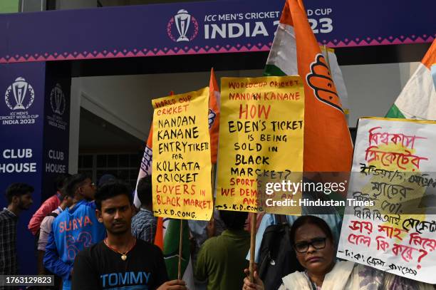 Congress members hold a demonstration against allegedly black marketing of ICC Cricket World Cup 2023 tickets ahead of India vs South Africa match...