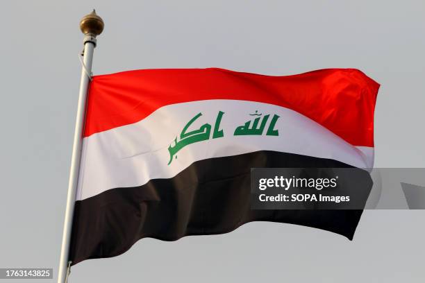 The national flag of the Republic of Iraq as a participating country at the 12th St. Petersburg International Gas Forum .