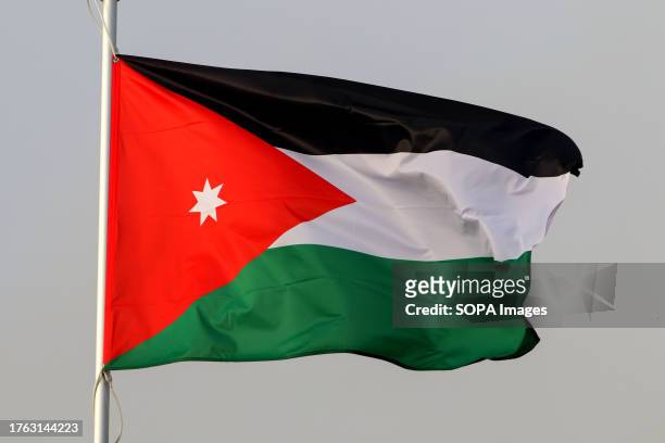 The national flag of the Hashemite Kingdom of Jordan as a participating country at the 12th St. Petersburg International Gas Forum .