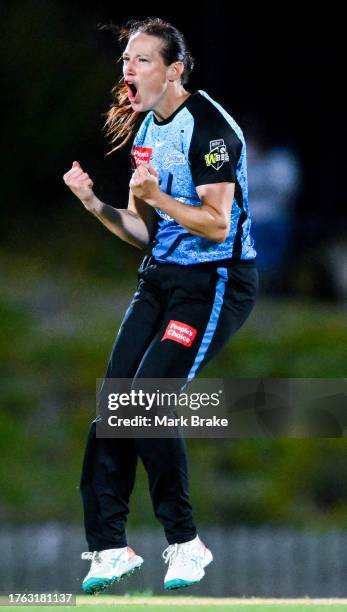 Megan Schutt of the Adelaide Strikers celebrates the wicket of Nicola Hancock of the Brisbane Heat during the WBBL match between Adelaide Strikers...