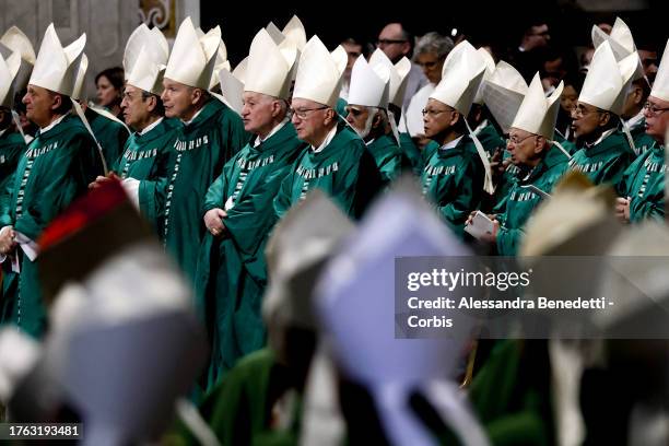 Cardinals attend the Holy Mass on the occasion of the conclusion of the 16th Ordinary General Assembly of the Synod of Bishops at St. Peter's...